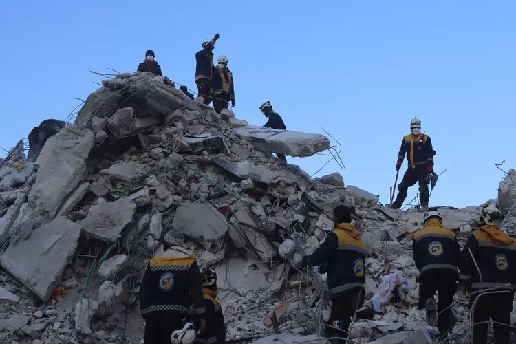 One Year After the Earthquake: A Catastrophe Doubled